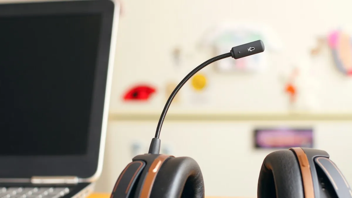 Headset and laptop on an office desk