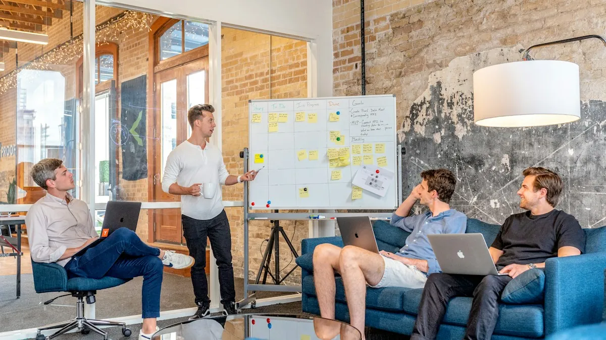Team planning session around a whiteboard in a bright office