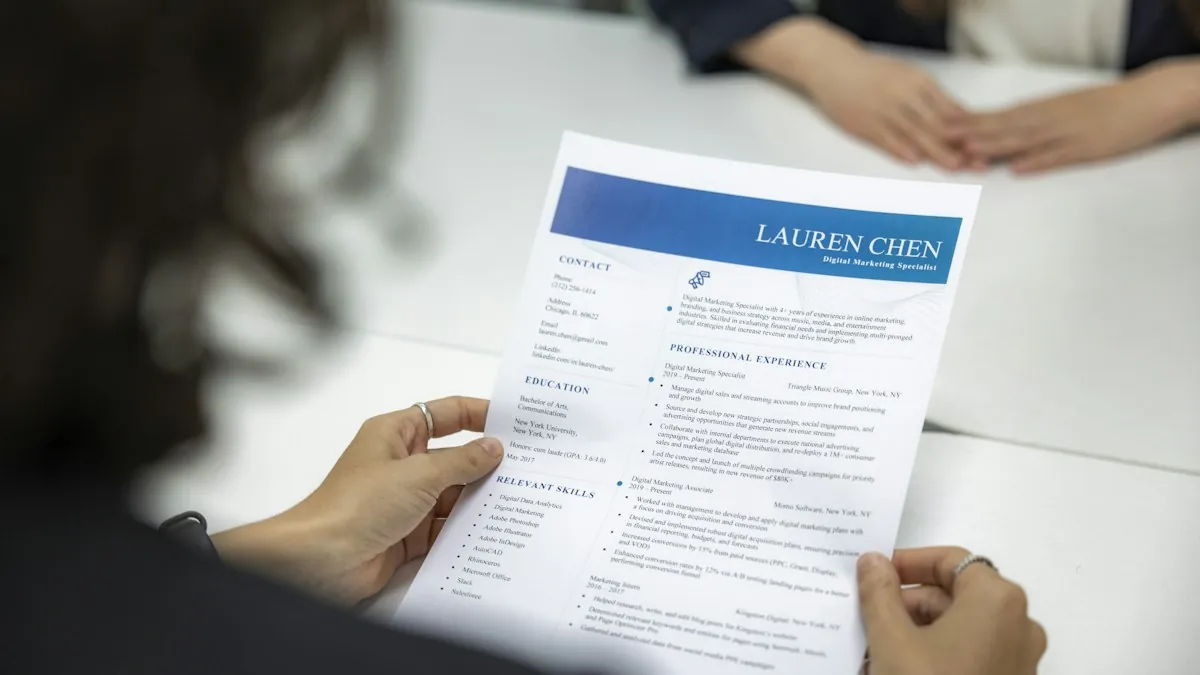 Recruiter reviewing a printed resume &mdash; apply online for jobs in Mohali