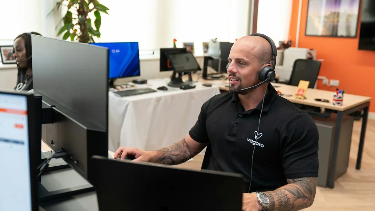Support agent wearing a headset working at a computer &mdash; support jobs in Mohali