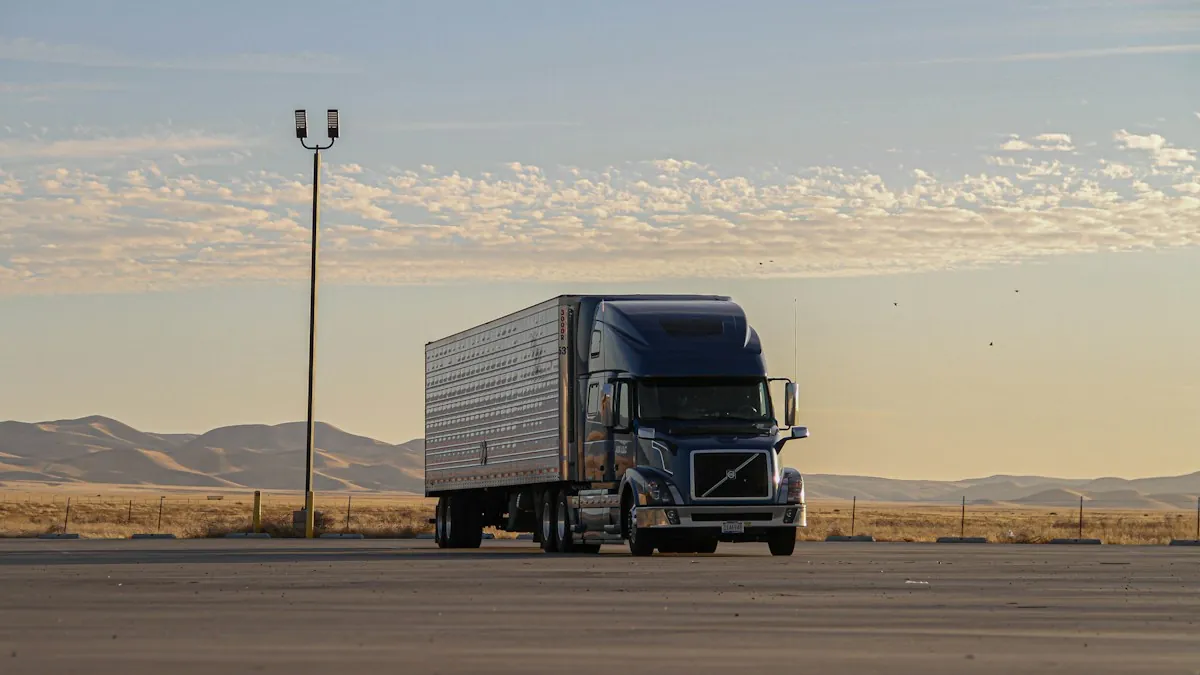 Volvo semi-truck pulling a dry van trailer on an open road &mdash; logistics support for trucking companies